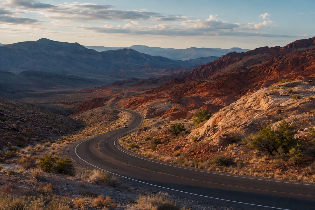 Desert highway crossing mountain terrain