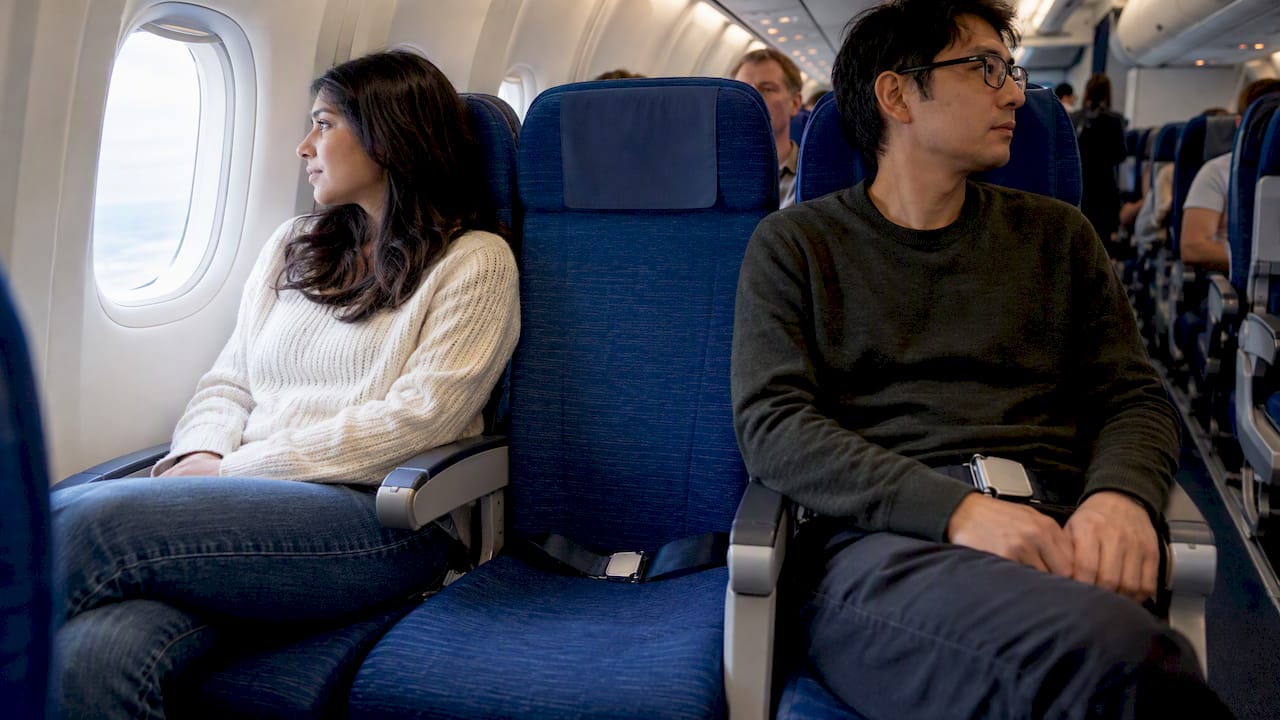 Window and aisle seats in an economy cabin